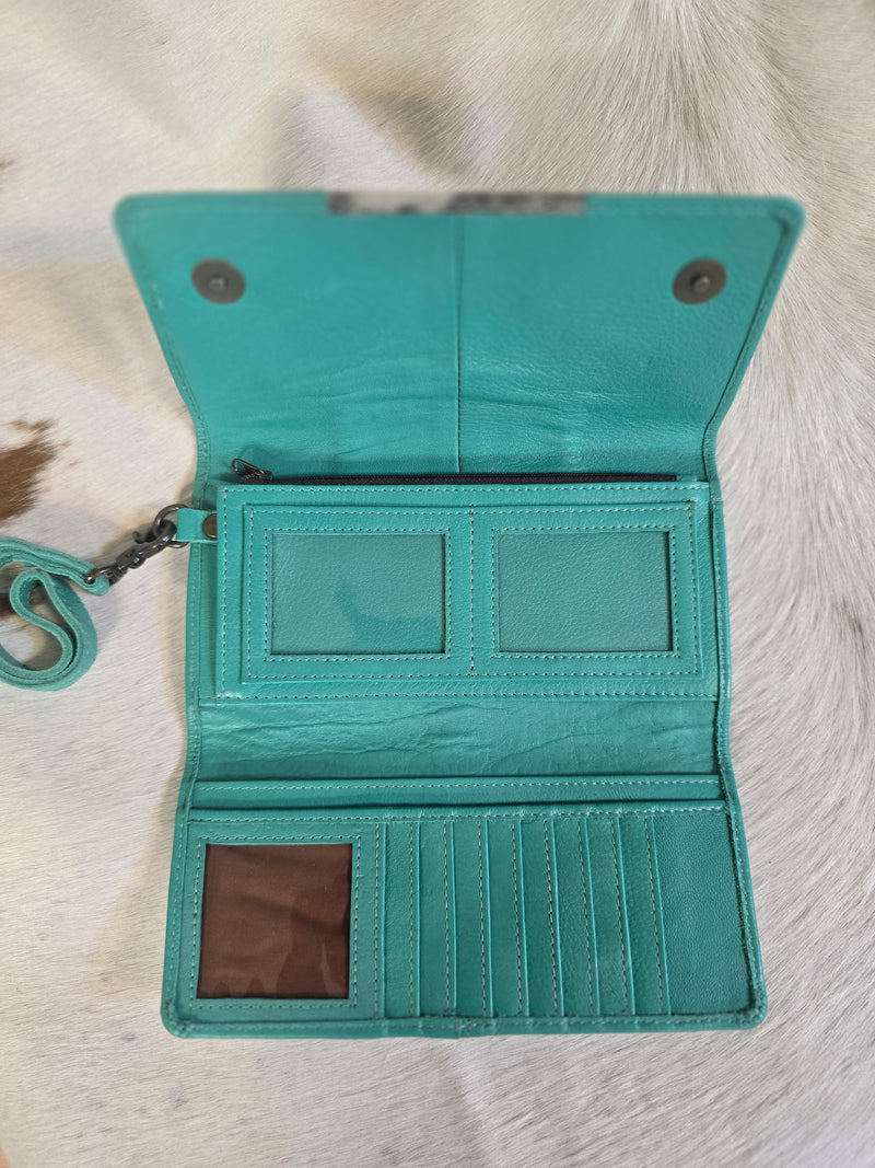 LEATHER HAIR ON TURQUOISE CLUTCH