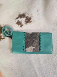 LEATHER HAIR ON TURQUOISE CLUTCH