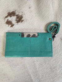 LEATHER HAIR ON TURQUOISE CLUTCH